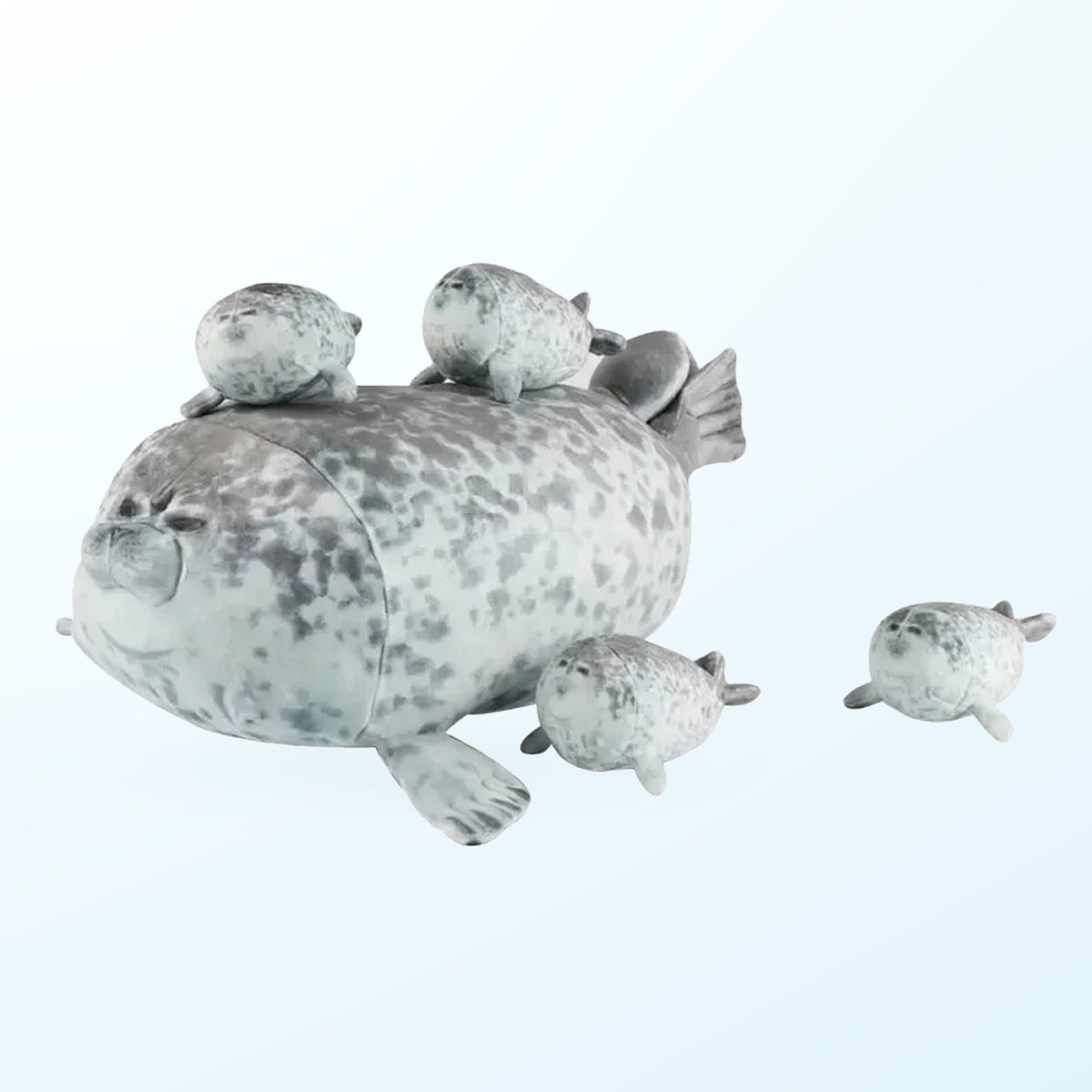 Mama blob seal plush with baby seals on her back, side view