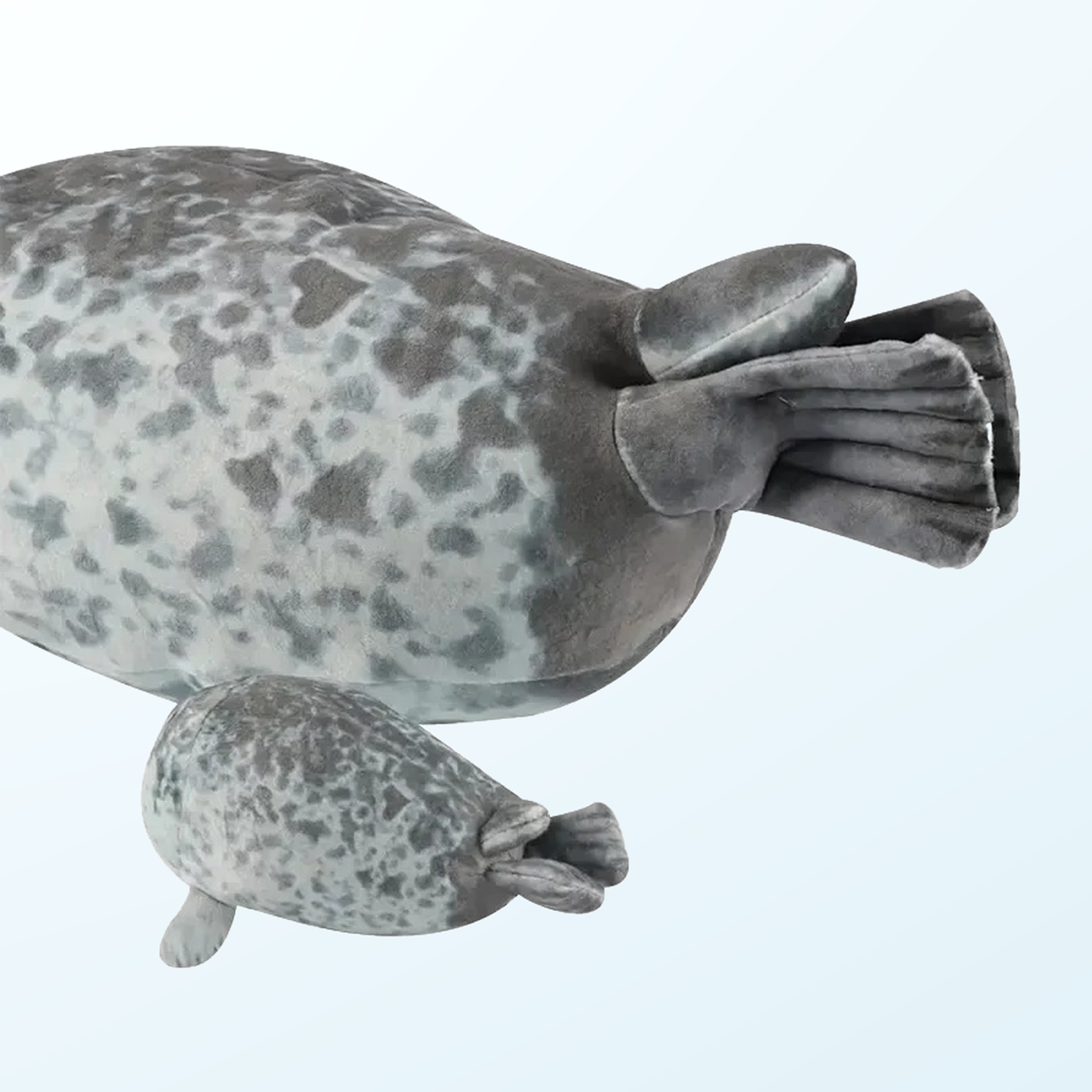 Close-up of the blob seal plush tail flippers and a baby seal